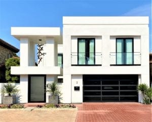 A white contemporary home with balconies